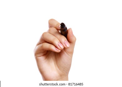 A Hand Holding A Black Marker, Isolated On White Background