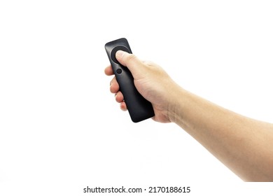 A hand holding a black simple fan remote - Shutterstock ID 2170188615