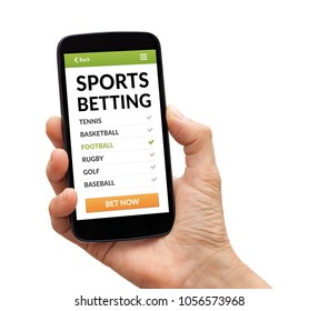 Hand Holding A Black Smart Phone With Sports Betting Concept On Screen. Isolated On White Background. All Screen Content Is Designed By Me.