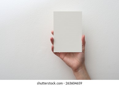 Hand Holding Blank Card On White Background