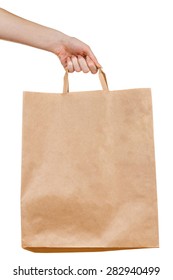 Hand Holding Blank Kraft Paper Bag Isolated On White Background