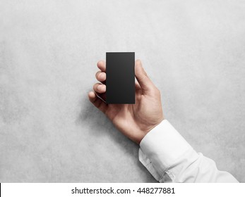 Hand Holding Blank Vertical Black Business Card, Design Mockup. Clear Calling Card Mock Up Template Hold Arm. Visiting Pasteboard Paper Surface Display Front. Grey Check Card Holder Presentation