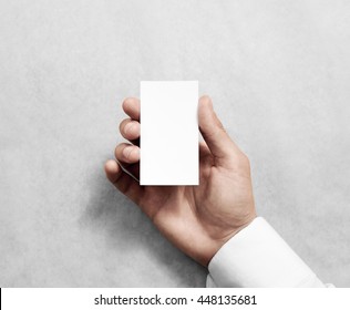 Hand Holding Blank Vertical White Business Name Card Mock Up. 