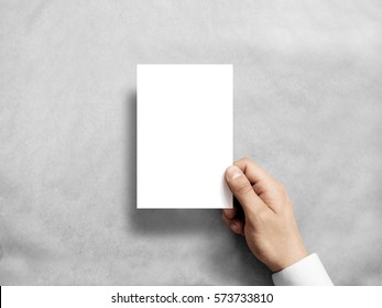 Hand Holding Blank White Vertical Postcard Flyer Mockup. 6 X 4 Leaflet Mock Up Presentation. Postal Holder. Man Show Clear Post Card Paper. Sheet Template. Invitation Booklet Reading First Person View