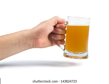 Hand Holding Bottle Of Beer And Beer Mug. White Isolated Studio Shot.
