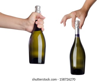 Hand Holding Bottle Of Champagne Isolated On White