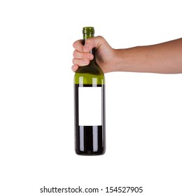 Hand Holding A Bottle Of Red Wine, Isolated On White