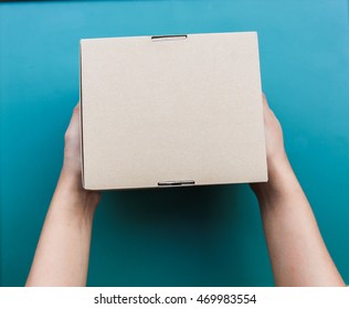 Hand Holding A Box