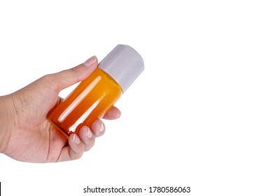 Hand holding Boxing liniment bottle isolated on white background.For muscular pains - Shutterstock ID 1780586063