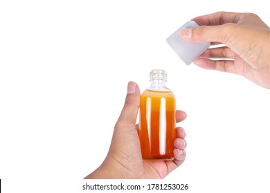  Hand holding boxing liniment isolated on white background.For muscular pains,Bruises,and Sprain muscular spasm apply this liniment and massage  - Shutterstock ID 1781253026