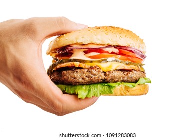 Hand Holding A Burger On White Background. Eating And Healthy Cincept.
