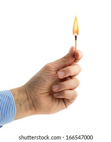 Hand Holding A Burning Matchstick On White Background