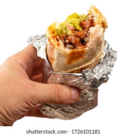 Hand Holding a Burrito with a Bite Out