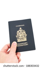 Hand Holding Canadian Passport Isolated On White Background