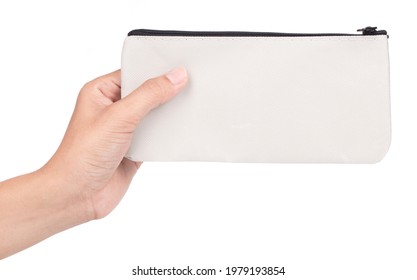 Hand Holding Canvas Stationery Bag Isolated On White Background.