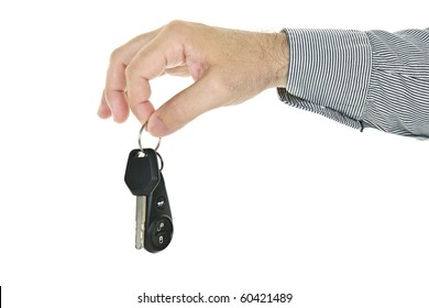 Hand Holding Car Key And Remote Entry Fob Isolated On White Background