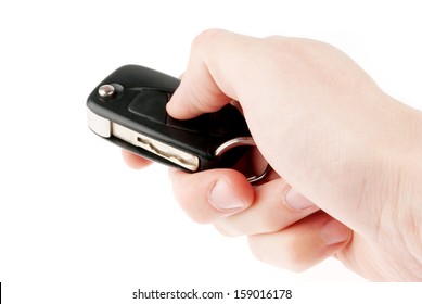 Hand Holding Car Keys Isolated On White Background 