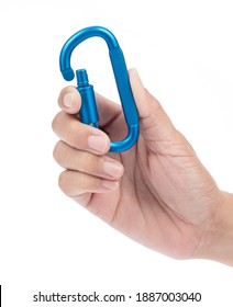 Hand Holding Carabiner Isolated On A White Background.