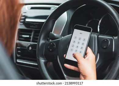 Hand Holding Cell Phone With Emergency Number 911 In Car