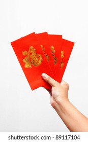 Hand Holding Chines Red Envelope