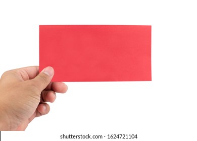 The Hand Is Holding The Chinese Red Envelope On A White Background