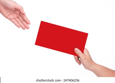 Hand Holding Chinese Red Envelope Isolated Over White Background