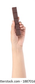 Hand Holding Chocolate Bar Isolated On White Background.