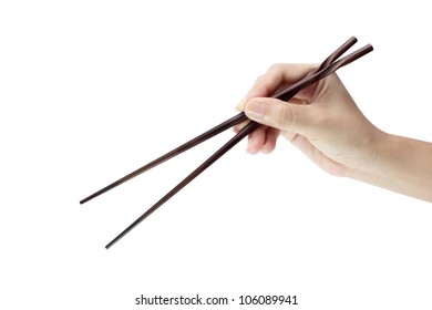 Hand holding chopsticks - Shutterstock ID 106089941