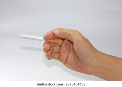 hand holding cigarette. isolated on white background. illustration