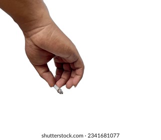 Hand holding a cigarette, white background