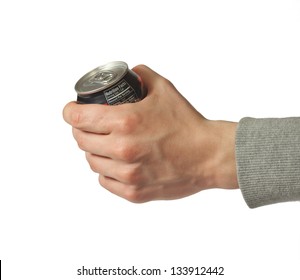 Hand Holding A Closed Can Of Soda