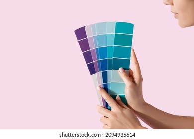 Hand Holding Color Samples Palette Design Catalog.