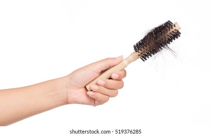 Hand Holding Comb Brush With Lost Hair, Isolated On White Background