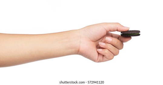 Hand Holding Cookie With Green Tea Filling Isolated On White Background