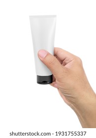 Hand Holding Cosmetic Plastic Tube Isolated On White Background.