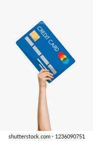 Hand holding a credit card cardboard prop