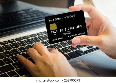 Hand Holding Credit Card Over Laptop Online Shopping Concept