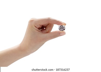 A hand holding an diamond, isolated on white background