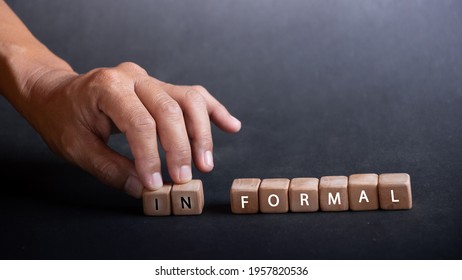 hand holding dice with text for illustration of "Formal and Informal" words
 - Shutterstock ID 1957820536