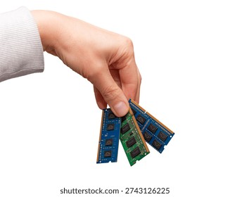A hand is holding different computer memory sticks like DRAM, DDR, SODIMM, and DIMM, showing the diversity in hardware memory types.
