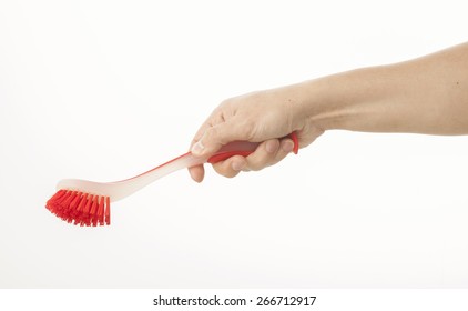 Hand Holding Dish Brush On White