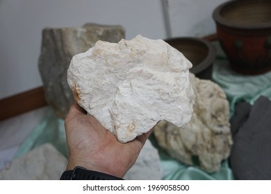 Hand Holding A Dolomite Rock, Dolostone Or Dolomitic Rock, Ceramic Raw Mineral.