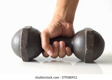 Hand Holding Dumbell On Isolated White Background.