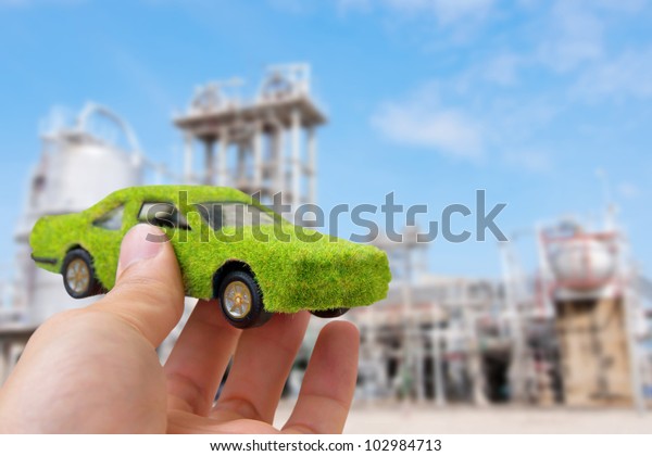 Hand Holding\
Eco car icon ,save energy\
concept