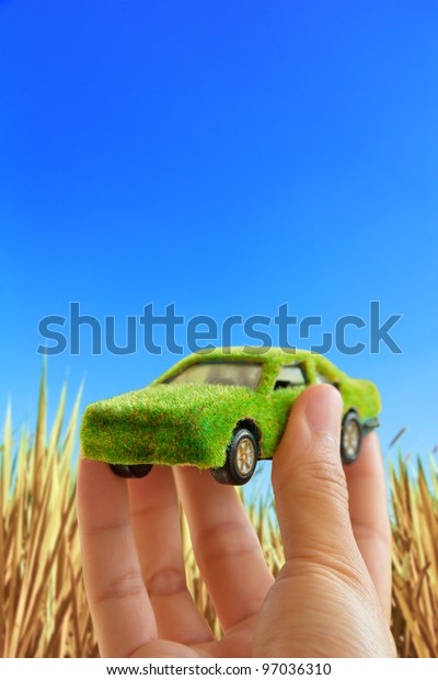 Hand Holding\
Eco car icon ,save energy\
concept