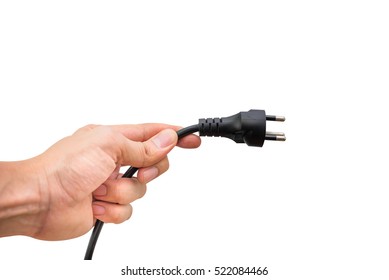 Hand holding electronic plug isolated on white. Image has clipping path