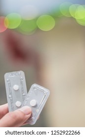 A Hand Holding Emergency Contraception (morning After Pill) Packs.