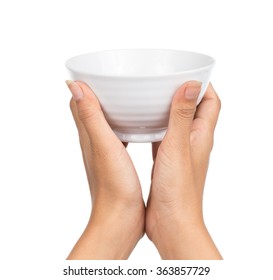 Hand Holding An Empty Bowl Isolated On White Background