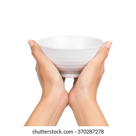 Hand Holding An Empty Bowl Isolated On White Background