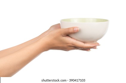Hand holding an empty bowl isolated on white background